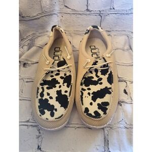 Hey Dude Women's Slip On Shoes Cow Print Tan Canvas Loafers Comfortable Sz 7
